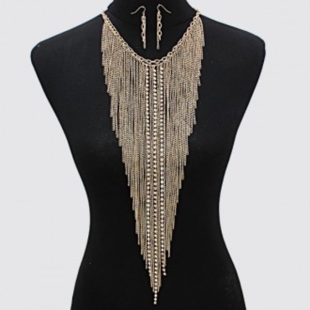 Long draping gold costume jewelry necklace